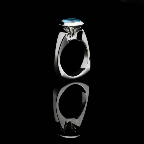 Muse ring with blue topaz in high polished silver