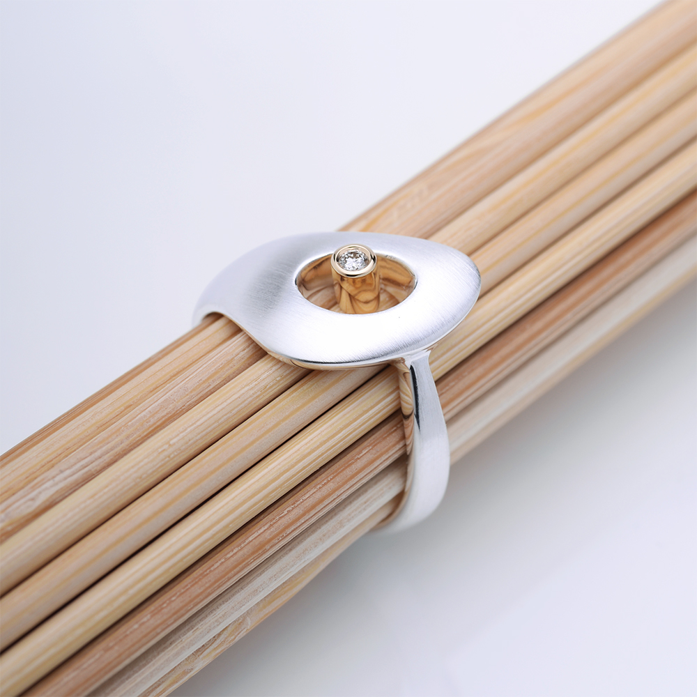 Outback Fossil Ring Small in silver and 18ct yellow gold with diamond, designed by Daniel Bentley. Sculptural ring inspired by the organic forms and contrasts of the Australian outback.