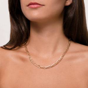 Tribute gold chain necklace worn elegantly