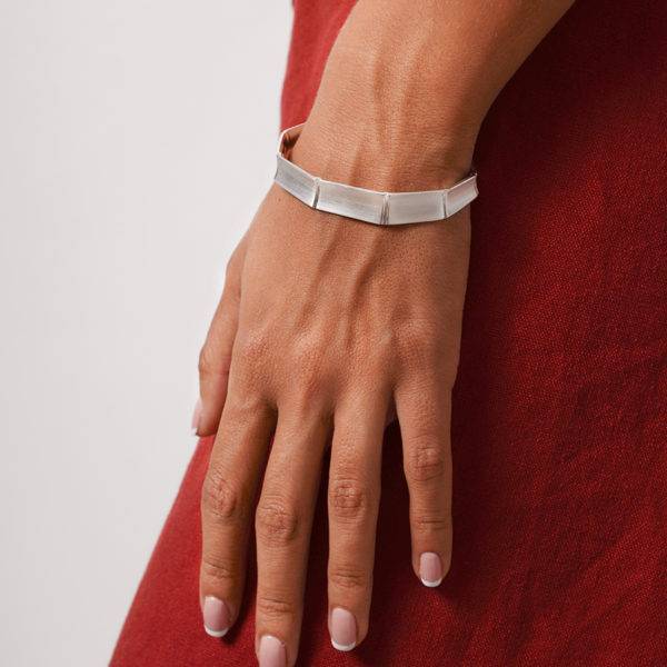 Bamboo cuff created in brushed and polished silver sitting beautifully on your wrist