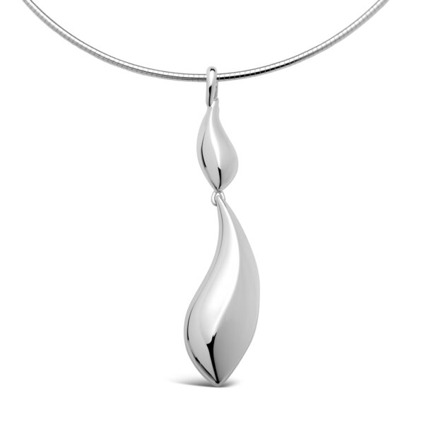 Voyager double pendant sculpted in polished silver drew inspiration from the Humpback whales’ journey from the Antarctic to the warm waters of Australia’s north coast.