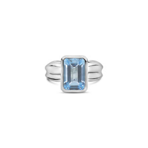 Ebb Tide step ring with blue topaz is inspired by the ebb and flow marks in the sand.