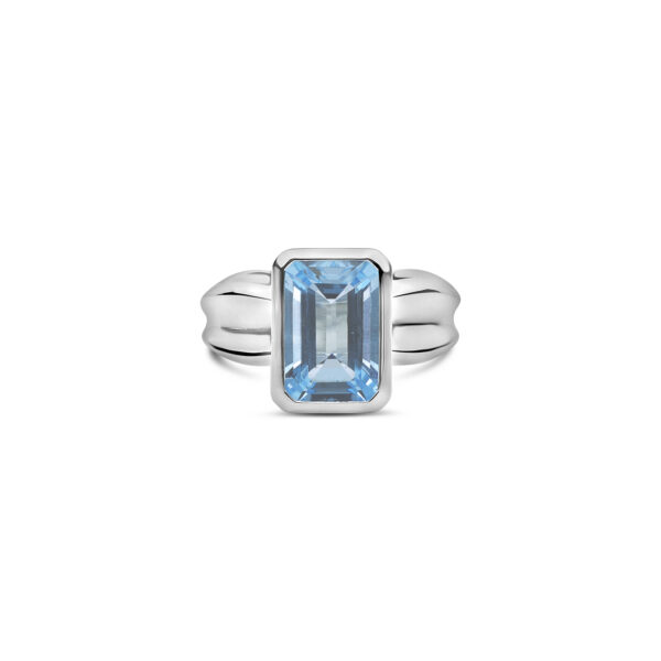 Ebb Tide step ring with blue topaz is inspired by the ebb and flow marks in the sand.