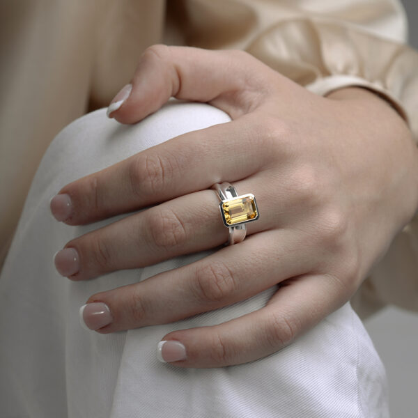 The gorgeous Ebb Tide step ring is sculpted in high polished silver with a stunning citrine.