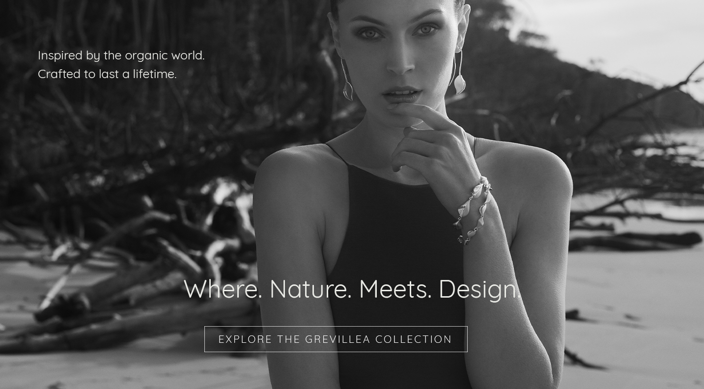 Model in natural setting wearing Grevillea Collection jewellery, blending organic beauty with refined design