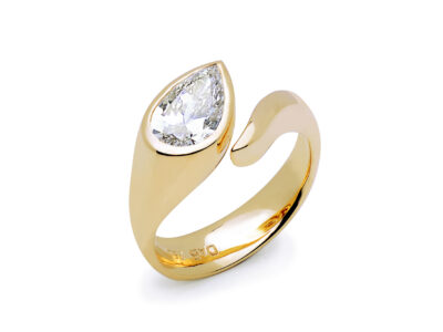 Bespoke engagement ring by Daniel Bentley Jewellery, sculpted in 18ct yellow gold with a pear-shaped diamond, one of a kind.